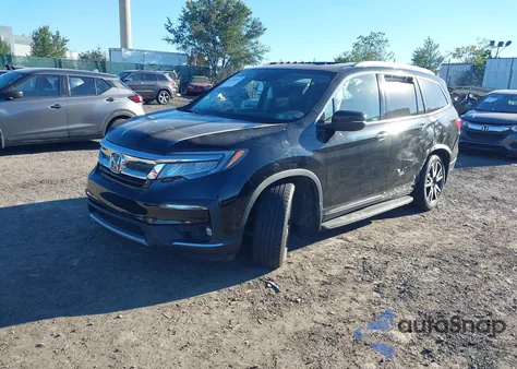 2021 Honda Pilot Awd Touring 8 Passenger z USA, uszkodzony, nr VIN 5FNYF6H94MB044999